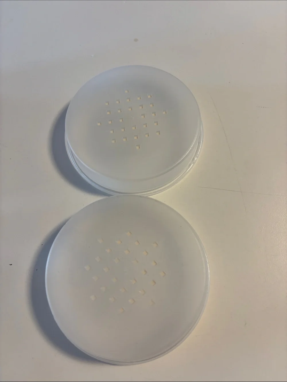 Chanel powder jars and puffs